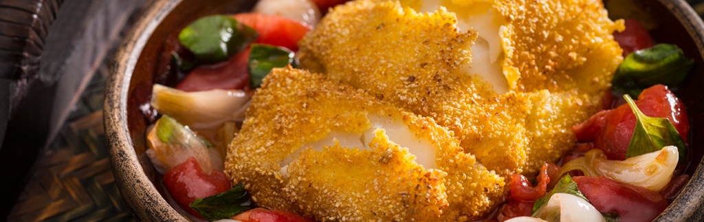 Polenta-Crusted Cod with Tomatoes and Spring Onion Stew