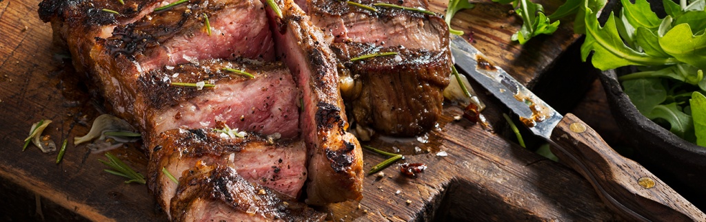 Grilled T-Bone Steak over Arugula