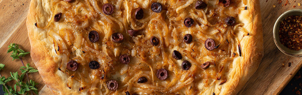 Pizza with Caramelized Onions and Ripe Olives