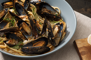 Mussels in White Wine and Sun-Dried Tomato Broth