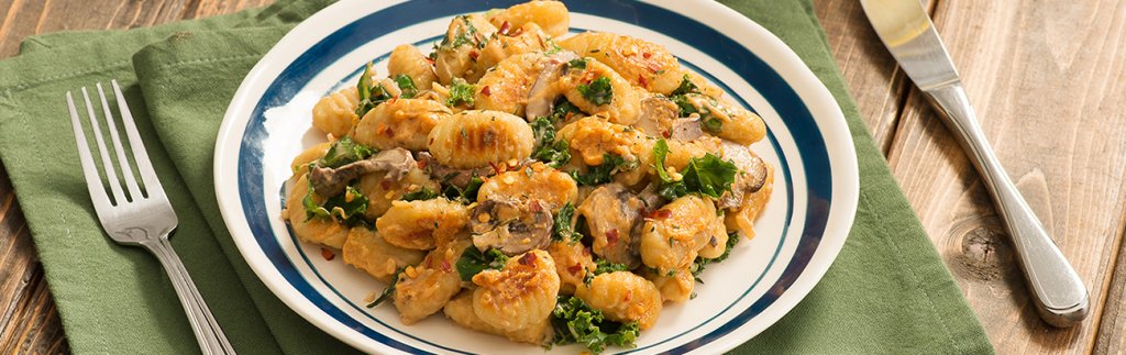 Gnocchi with Mixed Mushrooms, Kale and Tomato & Ricotta Pesto