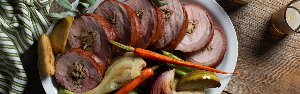 Prosciutto Wrapped Pork Loin with Apple and Rice Stuffing