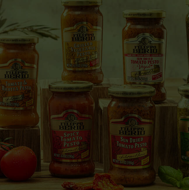 Stacked jars of pesto